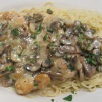 Chicken Picatta Pasta · Pan-seared chicken breast with garlic, capers and mushrooms in a white wine sauce over angel...