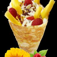 2. Mango Raspberry Sweet Crepe · Fresh mango, raspberries, custard cream, whipped yogurt, chocolate pearls, chocolate sauce a...