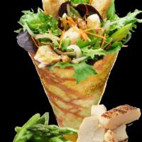 23. Thai Chicken Crepe · Sliced chicken breast, mesclun mix, red peppers, cucumbers, julienned carrots, cilantro, tha...