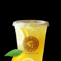 Iced Tea Lemonade · Served with lemon slices.