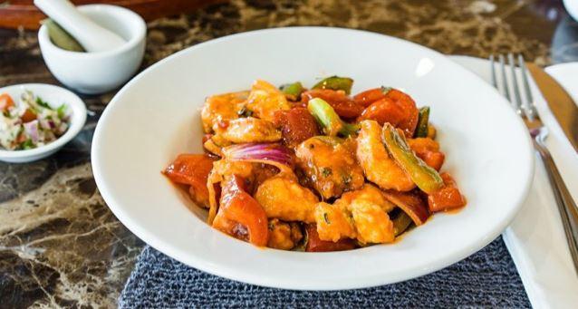 Chilli Chicken · Tender boneless deep fried chicken stir fried with fresh green chillies, bell peppers in sweet chilli garlic and soy sauce.