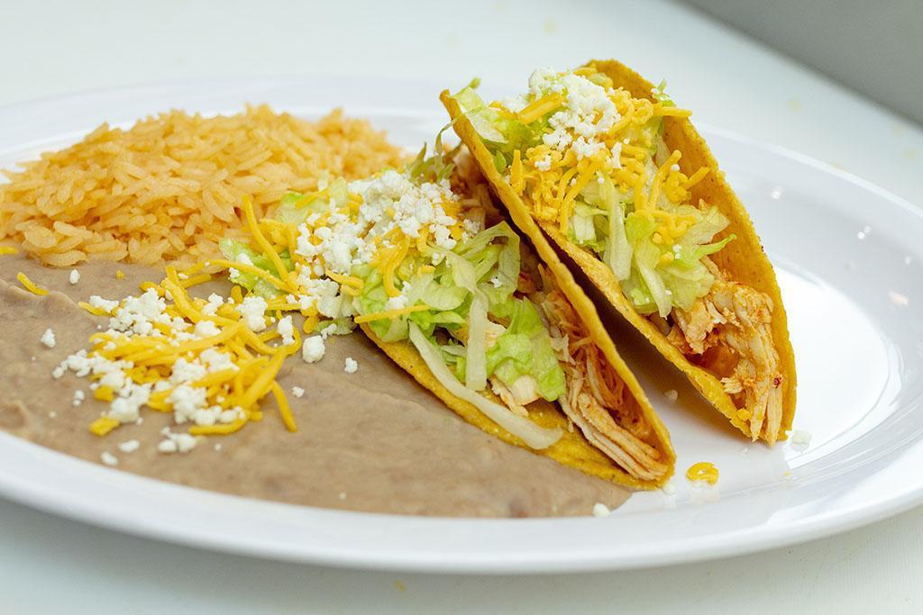 Combo #2 Two Hard Shell Tacos · 2 Hard Shell Shredded Beef, Chicken or Ground Beef Tacos with Lettuce & Cheese.Includes Rice and Beans