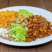 Combo #8 Carnitas or Adobada Plate · Carnitas(pictured) or Adobada,guacamole,lettuce,pico de gallo and tortillas.Include Rice and...
