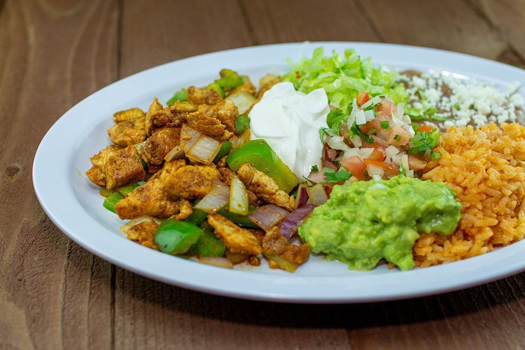 Combo #10 Fajitas Plate · Your Choice of meat cooked with bell peppers and onions. a side of pico de gallo, sour cream, guacamole, lettuce, rice and beans.