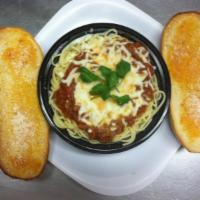 Spaghetti with Meat Sauce · Served with garlic bread.