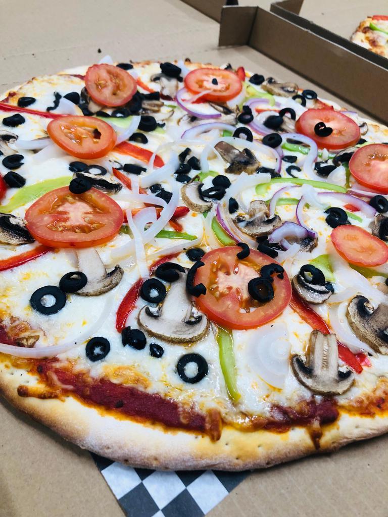 Vegetarian Pizza · Green bell peppers, mushrooms, black olives, onions, Roma tomatoes, garlic and mozzarella cheese.