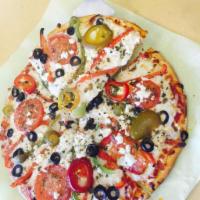 Mediterranean Pizza · Roma tomatoes, yellow and green peppers, Kalamata olives, fresh oregano, feta and mozzarella...