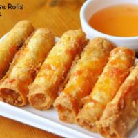 A27. Cheese Rolls · Crispy cheese rolls with onion and crabmeat.