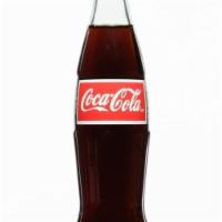 Mexican Coke · Made with pure cane sugar.