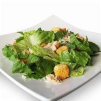 Caesar Salad · Romaine lettuce, croutons, shaved Parmesan cheese, and Caesar dressing.