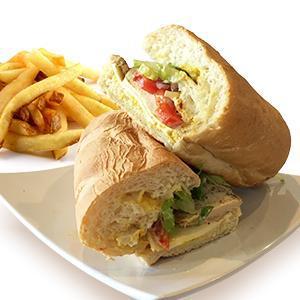 Grilled Chicken Breast Sandwich · Grilled chicken breast, cheese, lettuce, tomatoes, onions, mayo and mustard. Served with a side of French fries.