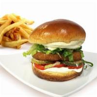 Turkey Burger · Lettuce, tomato, onion, pickle, and thousand island. Served with French fries.