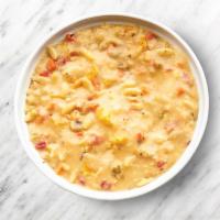 Chicken Orzo Soup · Chicken, orzo pasta, vegetables, and a hint of lemon.