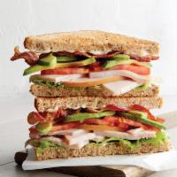 Uptown Turkey Avocado Sandwich · Oven-roasted turkey, bacon, avocado, tomato, lettuce, mayonnaise, harvest toast.