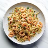 Shrimp Scampi Linguine · Shrimp, Parmesan, linguine, garlic butter, tomato, fresh parsley, and lemon juice.