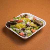 44. Greek Salad · Comes with feta cheese, pepperoncini and Greek olives. Served over lettuce with balsamic vin...