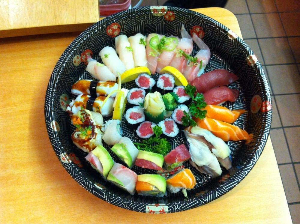 Sushi Deluxe · Nine pieces of sushi and one tuna roll. Served with garden salad or miso soup.