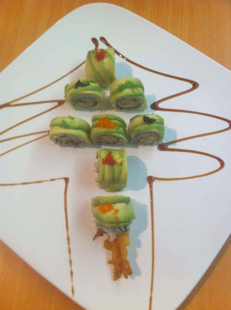 Christmas Roll · Shrimp tempura, eel cucumber, tobiko and avocado on top.