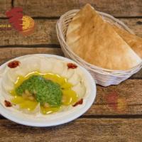 21. The Planet's Hummus · Blended mixture of chickpeas, tahini and olive oil with pita bread. Vegetarian.