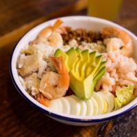 Ocean Cobb Salad · Prawns, crab, Bay shrimp, bacon, avocado, egg, bleu cheese crumbles with balsamic vinaigrette.