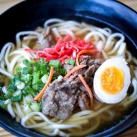Niku Udon · Thick Japanese udon noodle soup with sauteed beef.