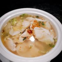 Chicken Noodle Soup · Rice noodle with sliced tender chicken on top of lettuce and bean sprouts in a savory broth.