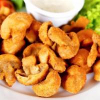 Fried Mushrooms · Cooked in oil.