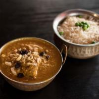 Chicken Korma · Boneless chicken cooked with coconut milk, coconut hage, with a creamy sauce and himalayan h...