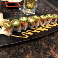 57. Cherry Blossom Roll · Salmon, avocado, crab meat, tuna, tobiko and 3 sauces.