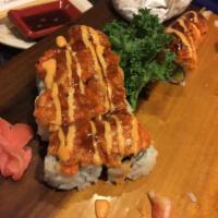 62. Fire Scallop Roll · California roll with spicy scallop, mozzarella cheese, spicy mayo baked and sesame seeds.