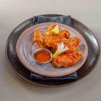 Bangkok Wings  · Deep-fried marinated chicken wings served with sweet and sour sauce and hot and spicy sauce.