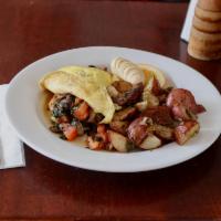 Omelet Fresco · Organic eggs, made with chopped Roma tomato, mushroom and fresh basil. Served with roasted r...