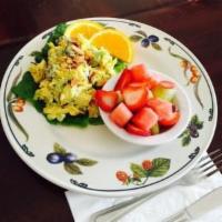 Curried Chicken Salad · Fresh chicken breast, golden currents, grapes, celery, walnuts and curry-mayo dressing. Serv...