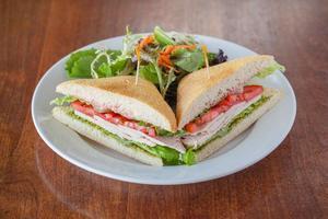 Cranberry Turkey Breast Sandwich · Fresh, natural oven-roasted turkey breast, lettuce and cranberry-pesto mayonnaise on choice ...