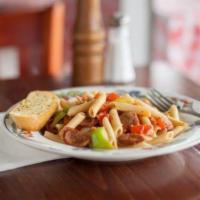 New Orleans Pasta · A New Orleans style penne pasta made with bell peppers, Cajun Andouille sausage, Roma tomato...