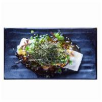 Spicy Tofu Salad · Cold tofu topped with finely chopped onion, kikurage and green onion topped with roasted ses...