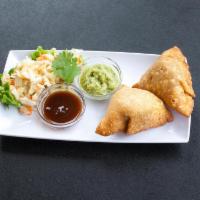 Vegetable Samosas · Golden fried, filled with potatoes and veggies, flaky pastry served with our mint, yogurt an...
