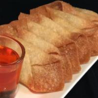 A12. Wonton Chips · 8 pieces. Deep-fried plain wontons to crispy golden brown. Served with sweet and sour sauce.