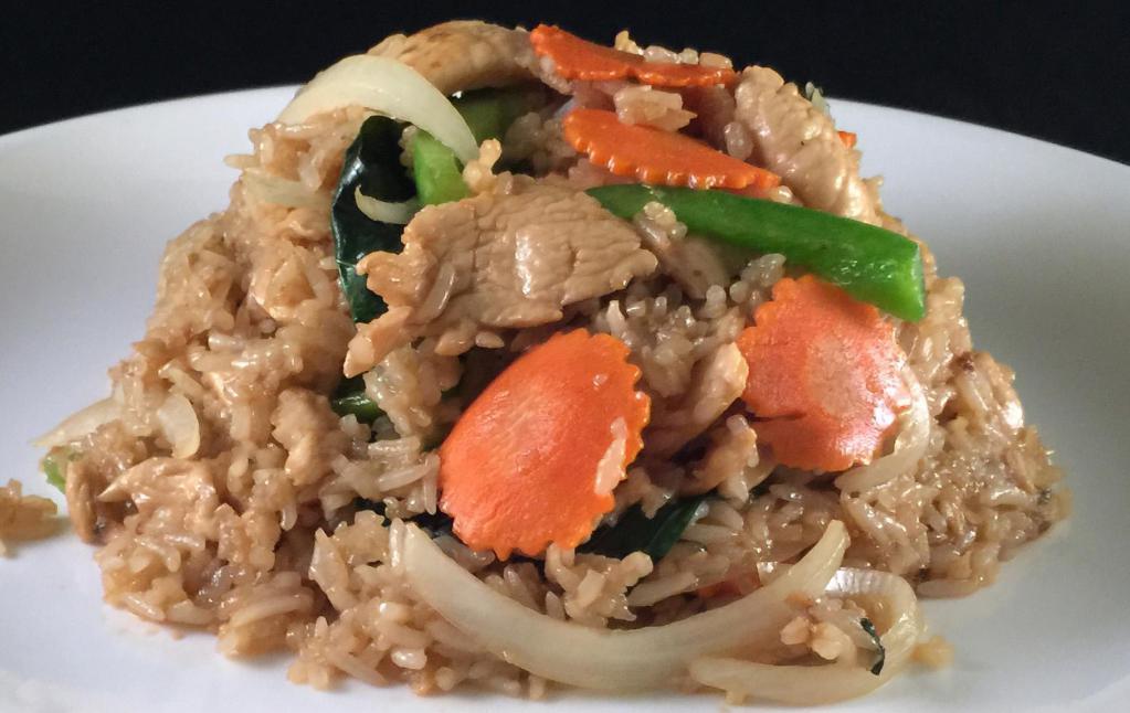 F2. Drunken Fried Rice · Onions, bell pepper and basil ,carrots,leaves finished with a dash of grounded white pepper.