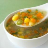 Sweet Corn Chicken Soup · Soup cooked with home made cream corn and hint of fresh crushed pepper.