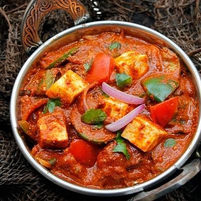 Kadai Paneer · Fried cottage cheese cooked with crushed whole spices with peppers, tomatoes and onion.