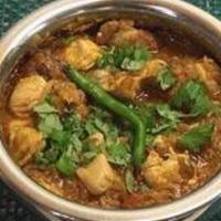 Chicken Mandhakini (House Special) · Semi gravy chicken cooked with onions, chilies and chopped boiled egg.
