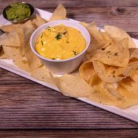 Dipping Queso · Traditional or spicy. Add picadillo beef and chorizo for additional charge.