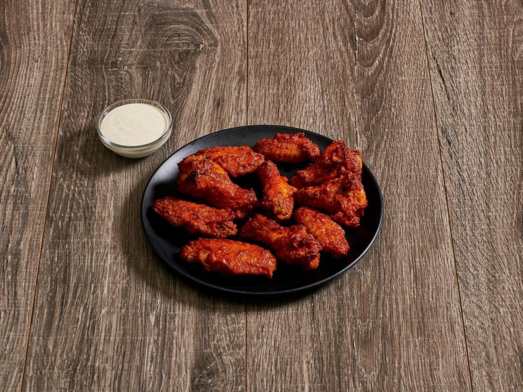 Buffalo Wings  · Fresh Chicken Wings Tossed in Buffalo Sauce.