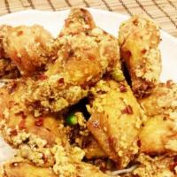 Salt and Pepper Chicken Wings · 8 wings. Spicy.