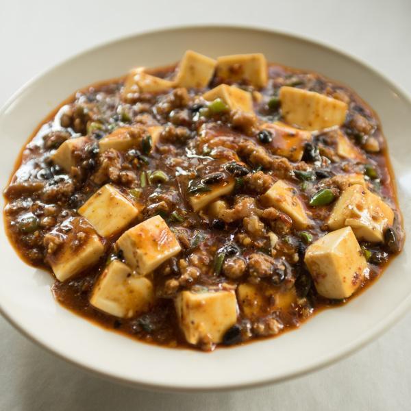 Ma Po Tofu · White tofu stir fried with ground pork in szechuan spicy bean sauce. Served with white rice. Spicy.