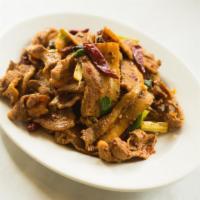 Hunan Style Pork Strip · Served with white rice. Spicy.