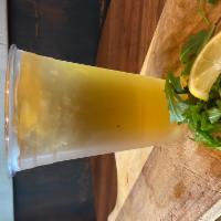 Green Ginger Iced Tea · Cold Brew Tea Garnished With Lemon