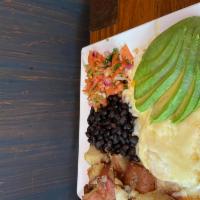 Huevos Rancheros Platter · 2 eggs any style, avocado, melted Monterey Jack cheese, pico de gallo, black beans and torti...