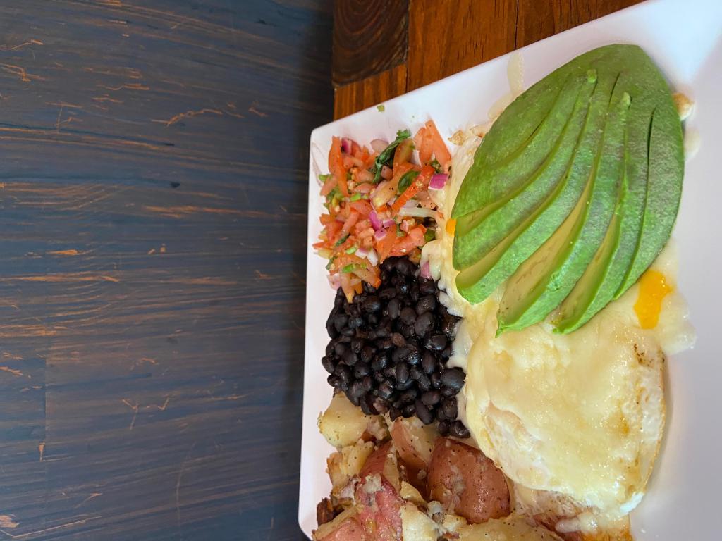 Huevos Rancheros Platter · 2 eggs any style, avocado, melted Monterey Jack cheese, pico de gallo, black beans and tortillas. Served with home fries .